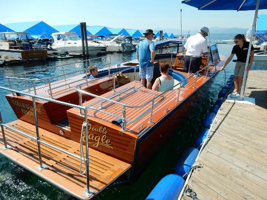 wooden boat ride to floating green restaurant CDA